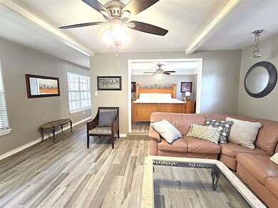 Luxurious master suite featuring a private living