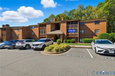Additional Front View of property, note Unit #8 is screened balcony on right, only owners have access to reserved parking.
