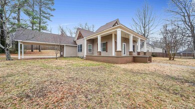 View of front of house featuring a porch and a fro