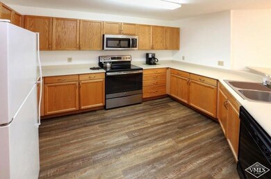 Spacious kitchen with plenty of storage.