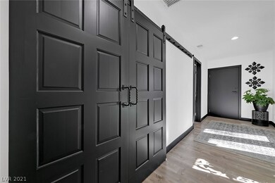 BARN DOORS HIDE LAUNDRY AREA - WIDE MAIN HALL