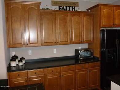 Arvada Kitchen 42 inch Cabs Fridge area