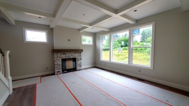 Living room with beamed ceiling