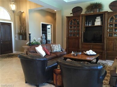 Great room; double front doors with transom; frenc