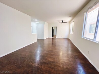 Unfurnished room featuring dark wood-style floors,