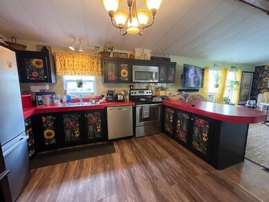 141 Lancaster Rd unit TRLR 9, Gorham, NH 03581 - photo 7