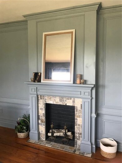 Decorative fireplace in living room.