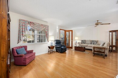 Living area featuring light wood finished floors, 