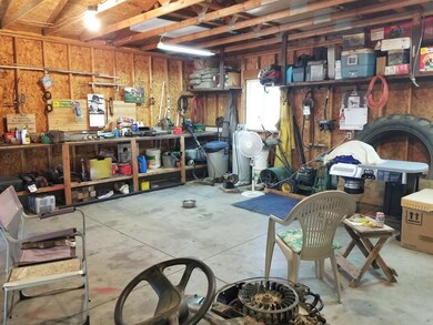 Large Garage with workbench & Shelving