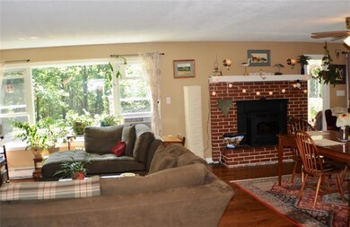 Living room with view of back yard