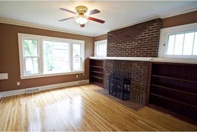 Original wood burning fireplace, with built-in she