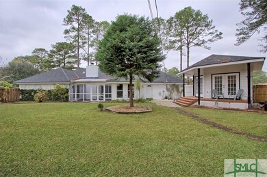 Lovely privacy fenced back yard with screen porch 