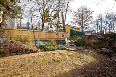 South facing walled in back yard/garden space.