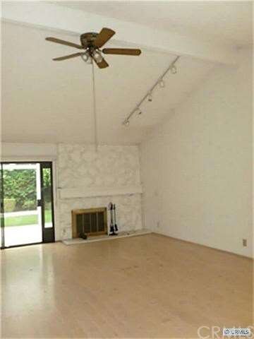 Living room with vaulted ceiling