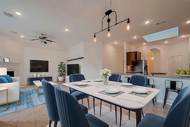 Virtually staged dining and living area