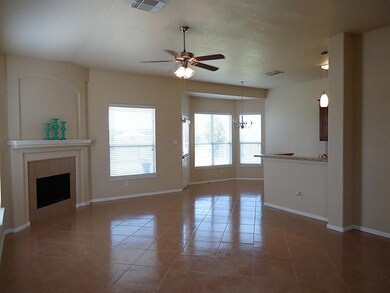 View from entrance of spacious and opened living area with  fresh paint and tile.