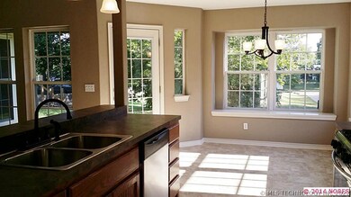 Open kitchen/dining with window bench seating