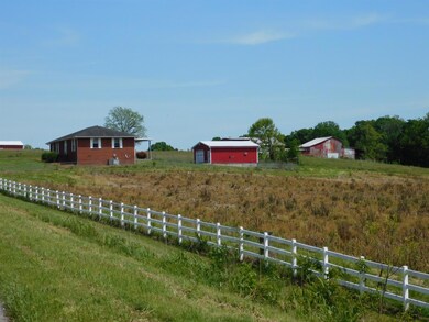 LOOKING FROM THE WEST BACK TOWARD HOUSE AND BARN
