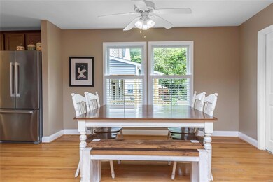 Large dining room space just off of the kitchen - lots of natural light to make those wood floors shine!!!