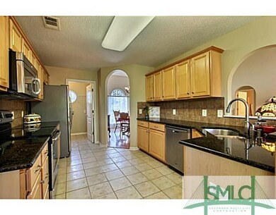 Kitchen. New Granite Counters and Tile Flooring