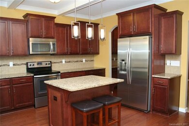 Gorgeous kitchen with granite counter tops and the