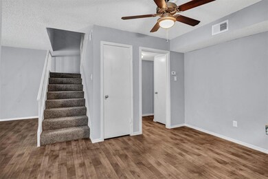 Dining area w/ view of stairway & storage closet