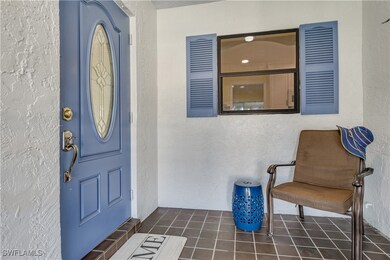 View of front sitting area on screened porch