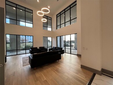 Living room with hardwood / wood-style flooring