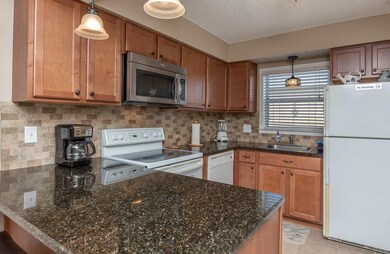 New cabinets, granite counters, updated lights!