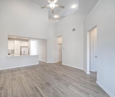 Unfurnished living room with light wood-style flo