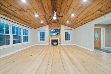 The inviting front porch entry leads you into a 7