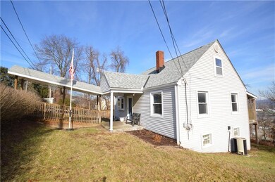 Front side and covered walkway to door