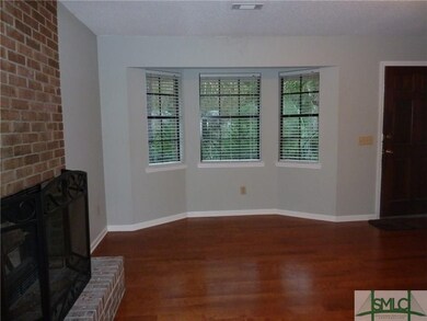 Living room has bay window