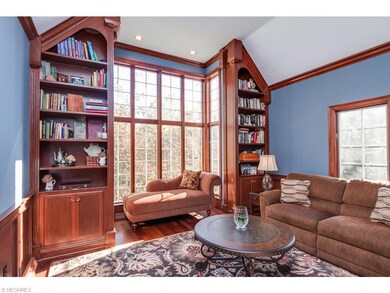 Charming library with wall of windows, 3 built-in 