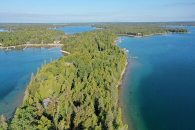 A S Crow Point Ln, Clark Township, MI 49719 - photo 6