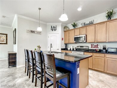 Kitchen featuring appliances with stainless steel