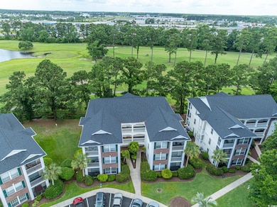 Aerial view of a golf club and a large body of water