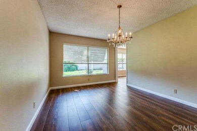 The formal dining room also looks out to the priva