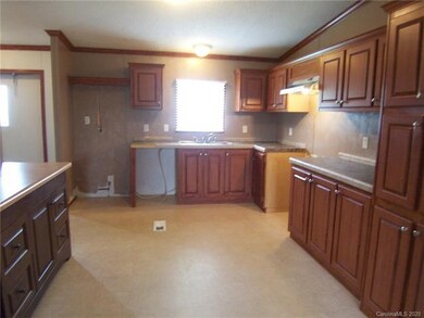 Kitchen has a breakfast area.