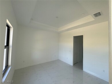 Empty room featuring a healthy amount of sunlight