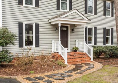 New vinyl siding, shutters and front door