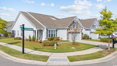 View of front of property featuring a front lawn a