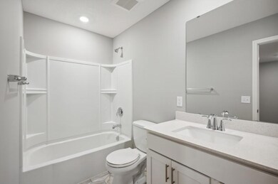 Stunning secondary bathroom with plenty of room for everyone to get ready.