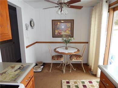 Eat-in Kitchen with double doors leading to Rear Y