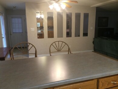 The eat-in Kitchen area is large enough for a Dini
