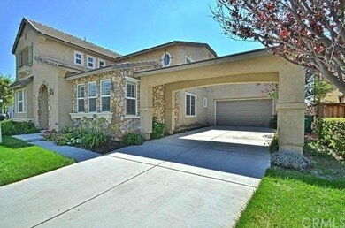 A long driveway leads to a 4 car tandem garage. Th