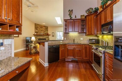 Crown Trim on cabinetry,  tiled backsplash