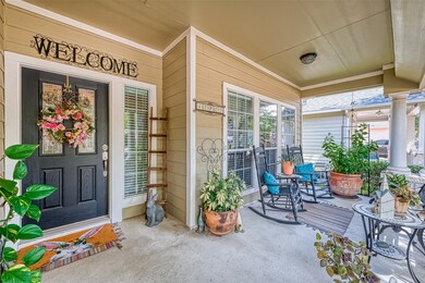 Cute front porch to side outside in the shade and enjoy a cup of coffee or a glass of wine.