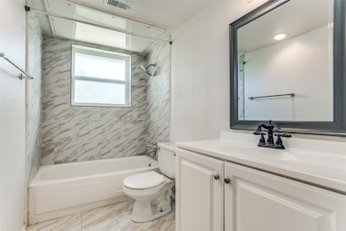 Bathroom featuring bathing tub / shower combination and vanity