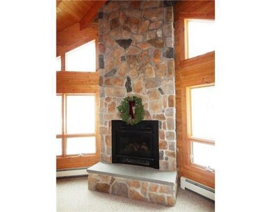 Living Room. Fieldstone Fireplace
